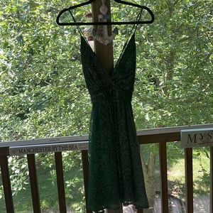 Emerald and silver cocktail dress.